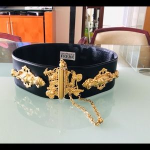 G. Ferre black leather belt with gold tone metal.